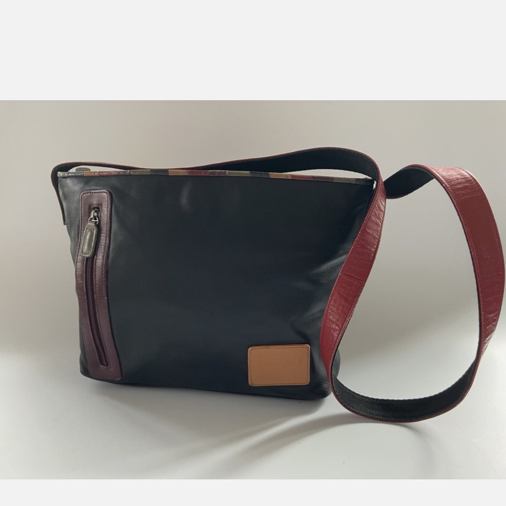 Carlos Falchi large bag for Target. Very good used condition. All zippers work